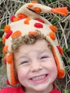 Orange Pom Pom Buggysnuggle Hat